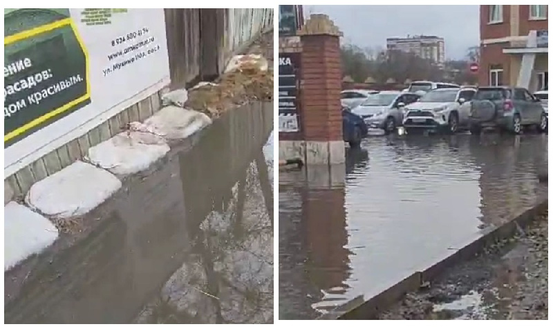 Потоп в центре Благовещенска: жители улицы Октябрьской строят дамбу